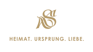 A stylish logo with the words "HEIMAT. URSPRUNG. LIEBE." in golden lettering. It conveys a sense of tradition and connectedness.
